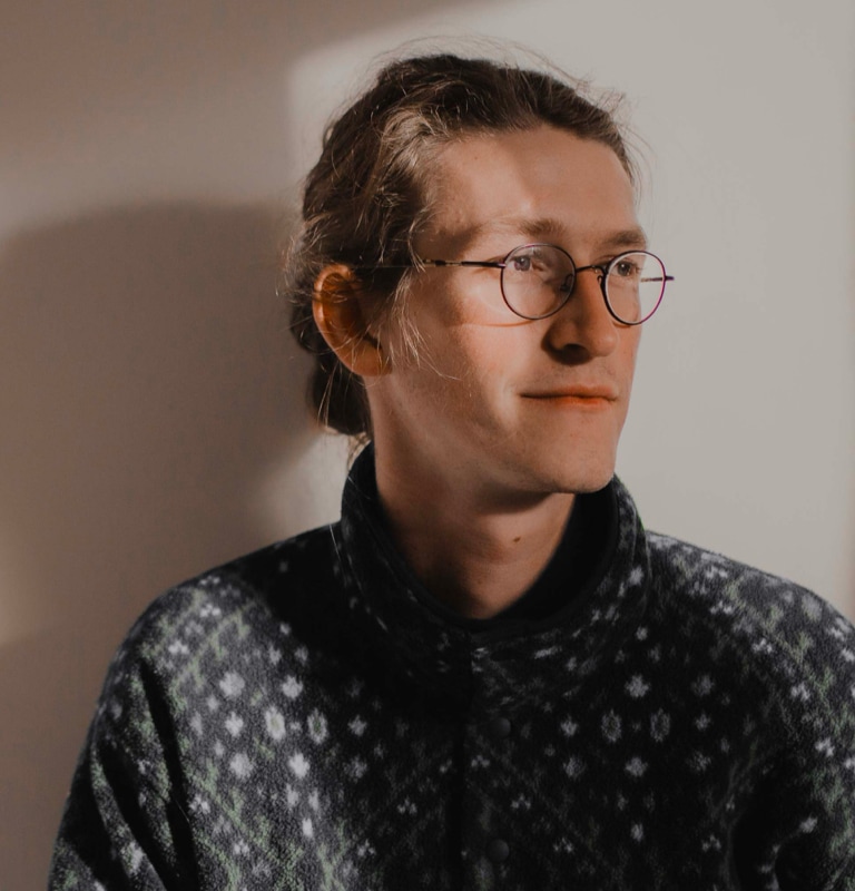 young entrepreneur portrait against grey wall