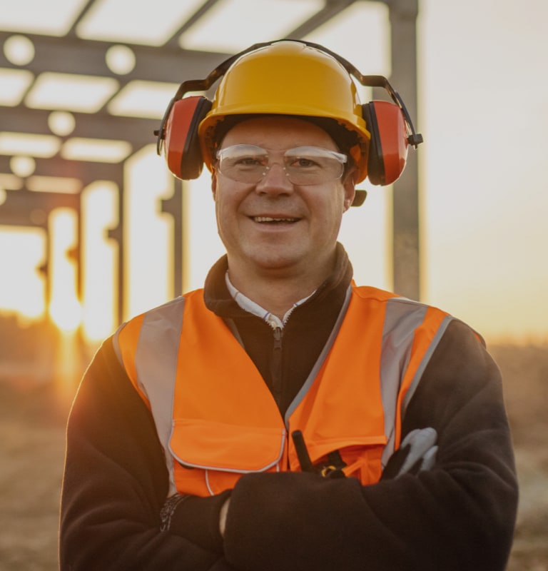 Contractor wearing safety gear at a job site